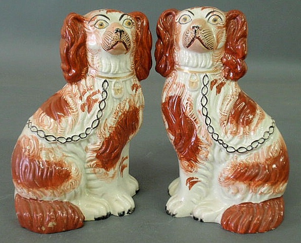 Appraisal: Pair of Staffordshire red and white seated spaniels h