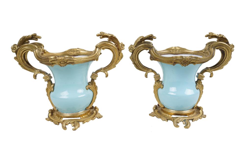 Appraisal: PAIR OF SEVRES STYLE PORCELAIN GILT BRONZE CACHEPOTSlate th century