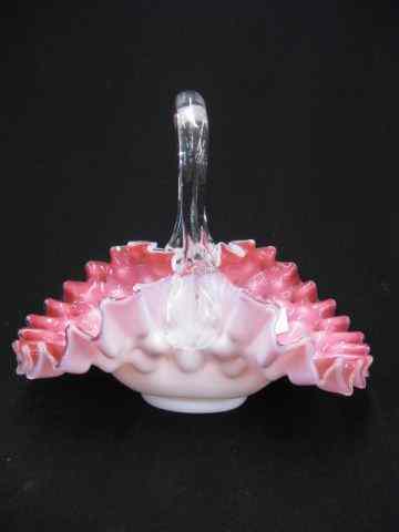 Appraisal: Cranberry Cased Art Glass Basket ruffled design clear handle ''