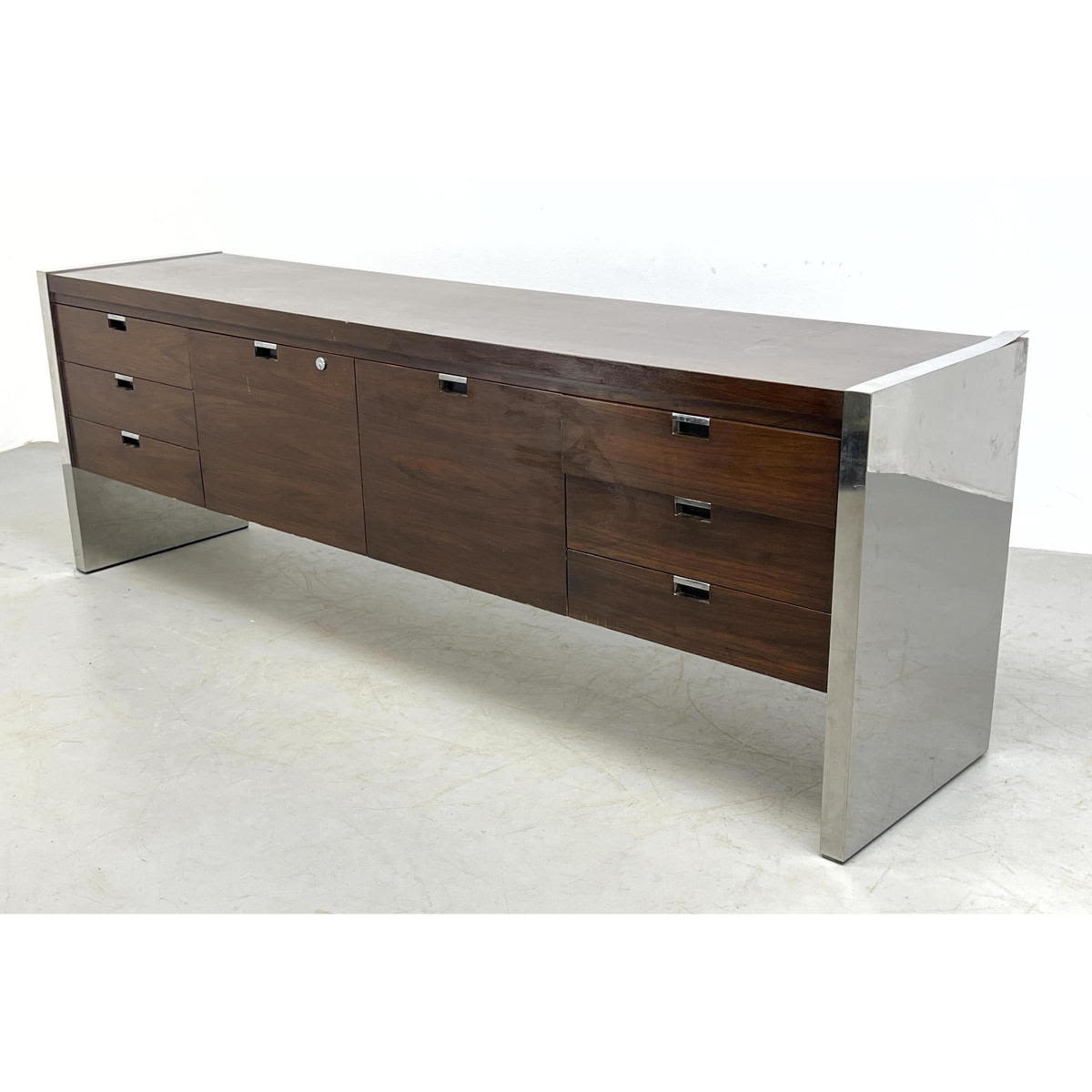 Appraisal: Roger Sprunger for Dunbar credenza with chrome sides Dimensions H