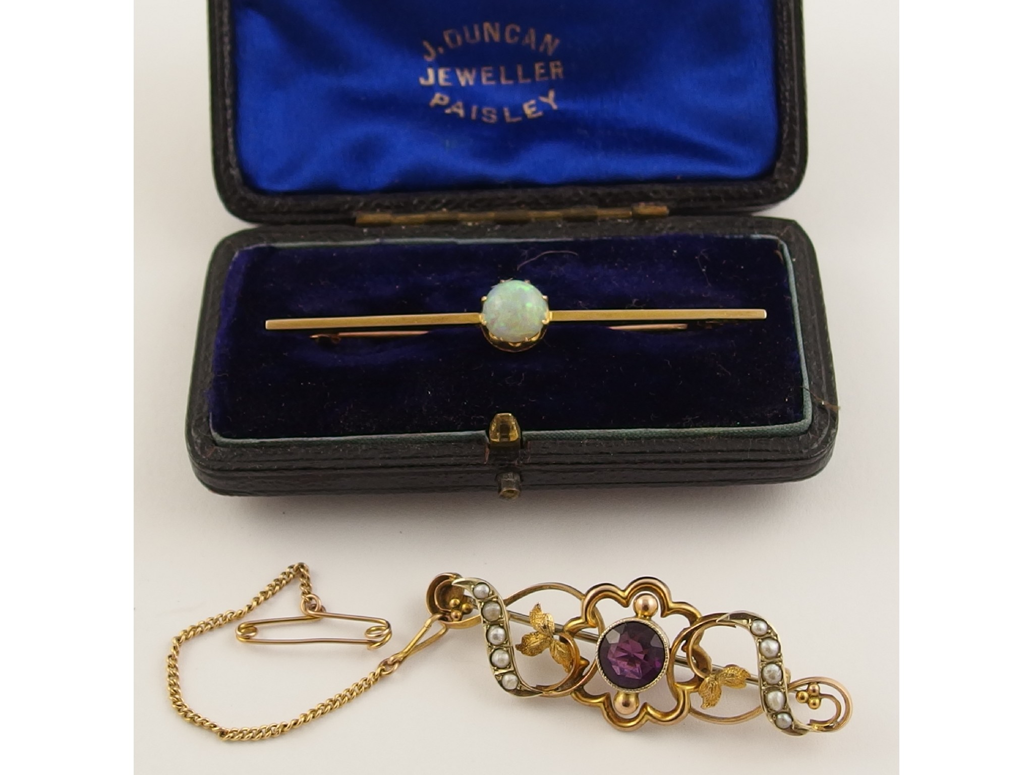 Appraisal: A ct opal set bar brooch and a ct amethyst