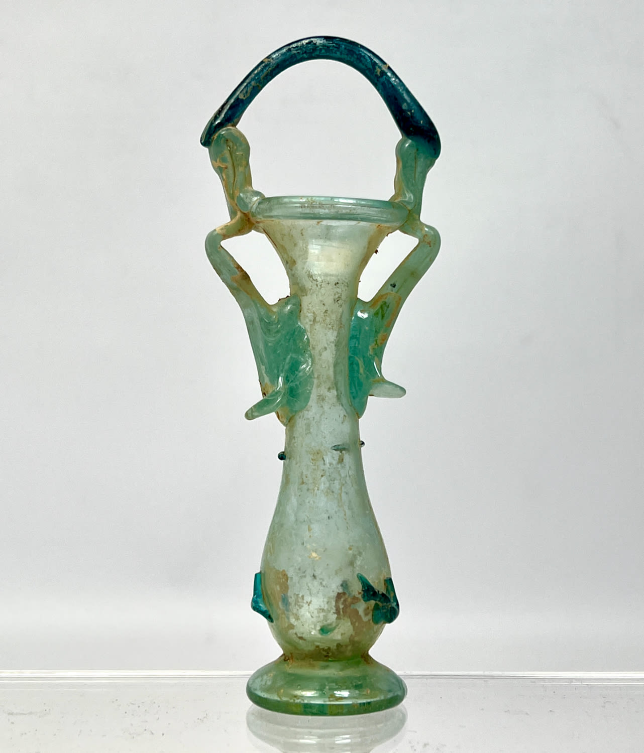 Appraisal: handled footed vase Ancient Roman glass green Dimensions H inches