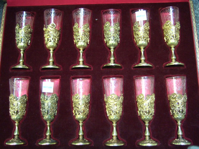 Appraisal: A set of twelve French silver gilt liqueur glasses and