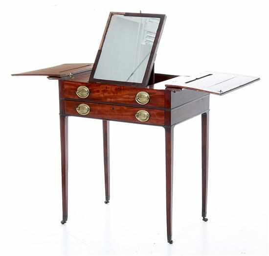 Appraisal: George III mahogany dressing table early th century serpentine rectangular