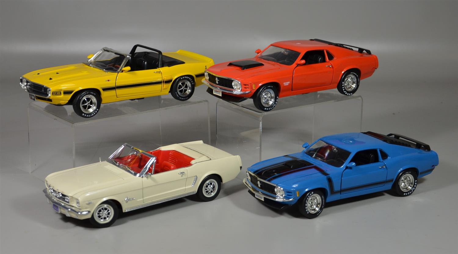 Appraisal: Mustang scale model cars Ertl red Ertl blue Mira Shelby