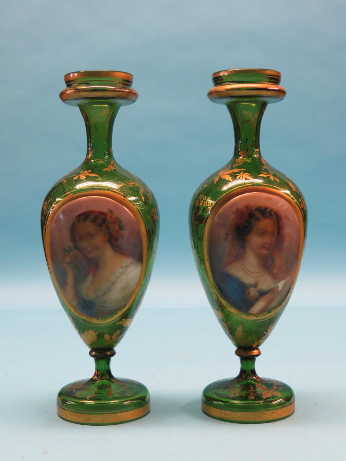 Appraisal: A pair of mid- th century gilded green glass vases