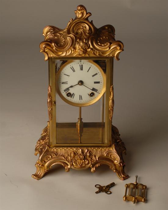 Appraisal: A Gilt Ansonia Mantle Tabletop Clock having a rococo canopy