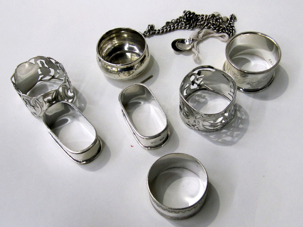 Appraisal: Lot comprising two pairs of silver napkin rings and three