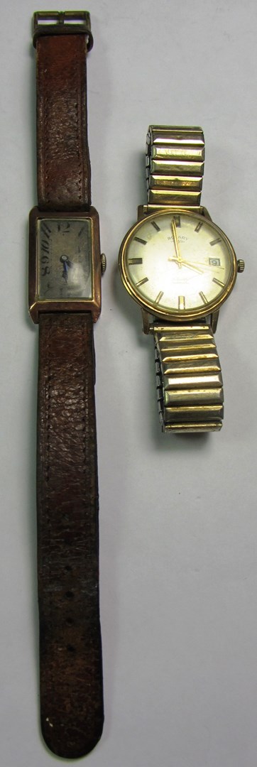 Appraisal: A gentleman's ct gold rectangular cased wristwatch with an unsigned