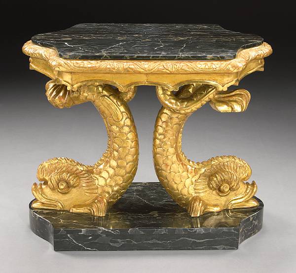 Appraisal: A Neoclassical style giltwood center table The inset shaped marble