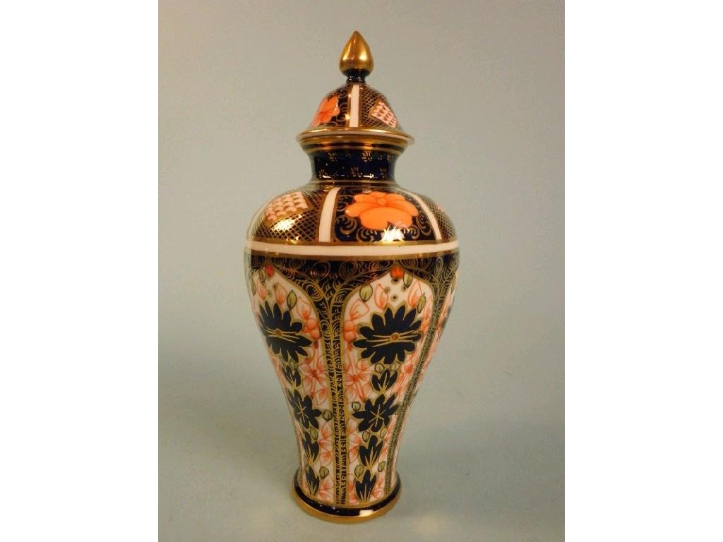 Appraisal: A Royal Crown Derby Imari pattern baluster shaped vase and