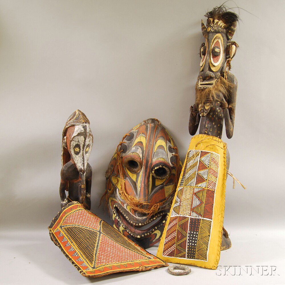 Appraisal: Four Carved African Oceanic Polychrome Wood Figure Masks and Two