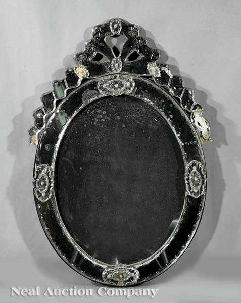 Appraisal: A Venetian Cut Glass Mirror early th c pierced crest