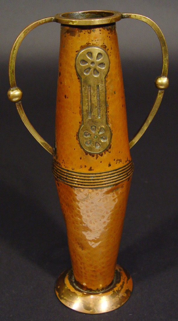 Appraisal: Successionist two handled copper and brass vase with applied and