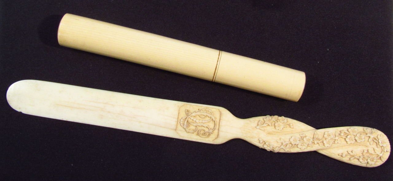 Appraisal: A thC carved ivory letter opener with shaped part pierced