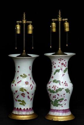 Appraisal: PAIR OF FAMILLE ROSE BALUSTER-FORM LAMPS Each enamel-decorated with prunus