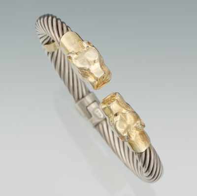 Appraisal: A Sterling Silver and Gold Panther Design Bracelet Sterling silver