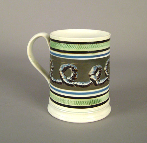 Appraisal: Mocha tankard th c with earthworm decoration on a gray