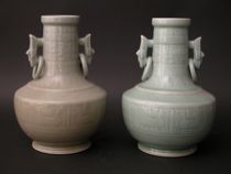 Appraisal: Korean Urns th Century A pair of decorative ceramic urns