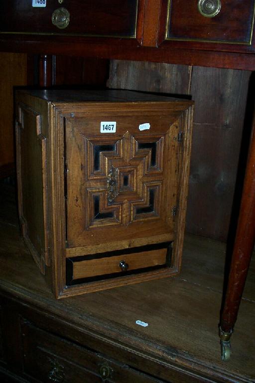 Appraisal: An th century spice cupboard principally in walnut the front