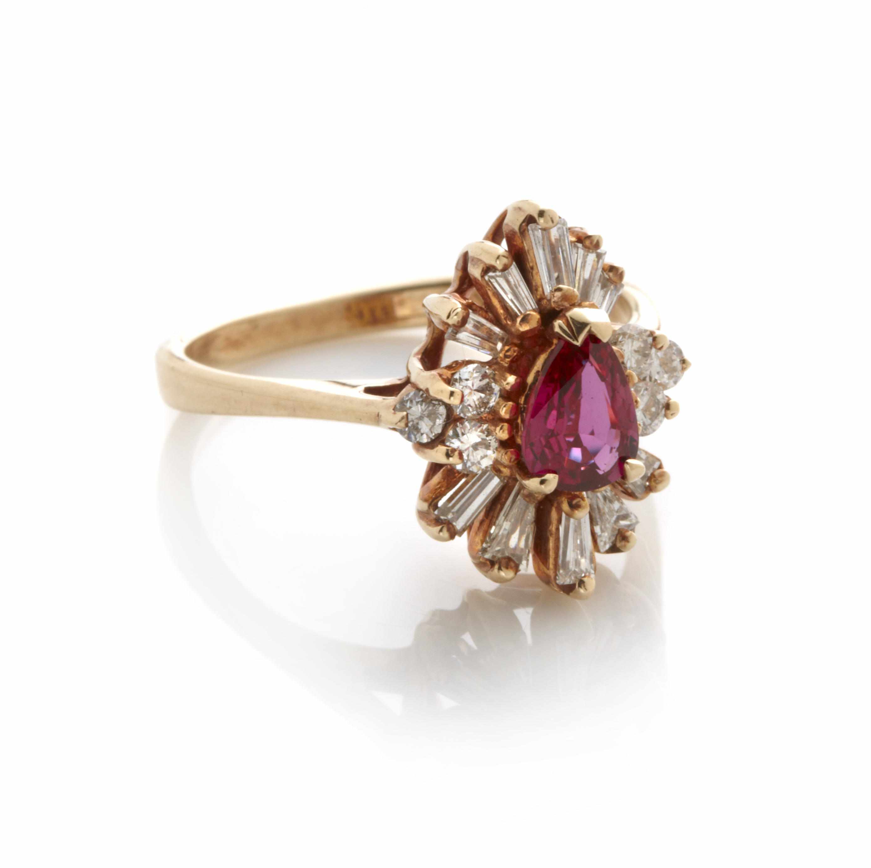 Appraisal: A pear-shaped ruby diamond and k gold cluster ring size