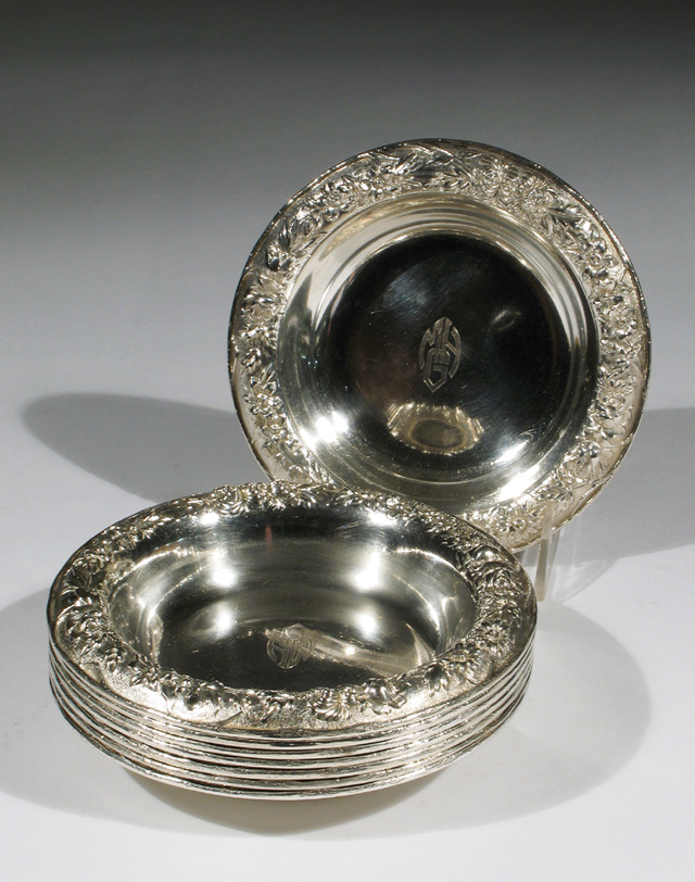 Appraisal: SET OF EIGHT STERLING SILVER BOWLS with repousse floral band