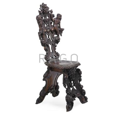 Appraisal: BAROQUE STYLE CHAIR Heavily carved walnut frame with cherubs th