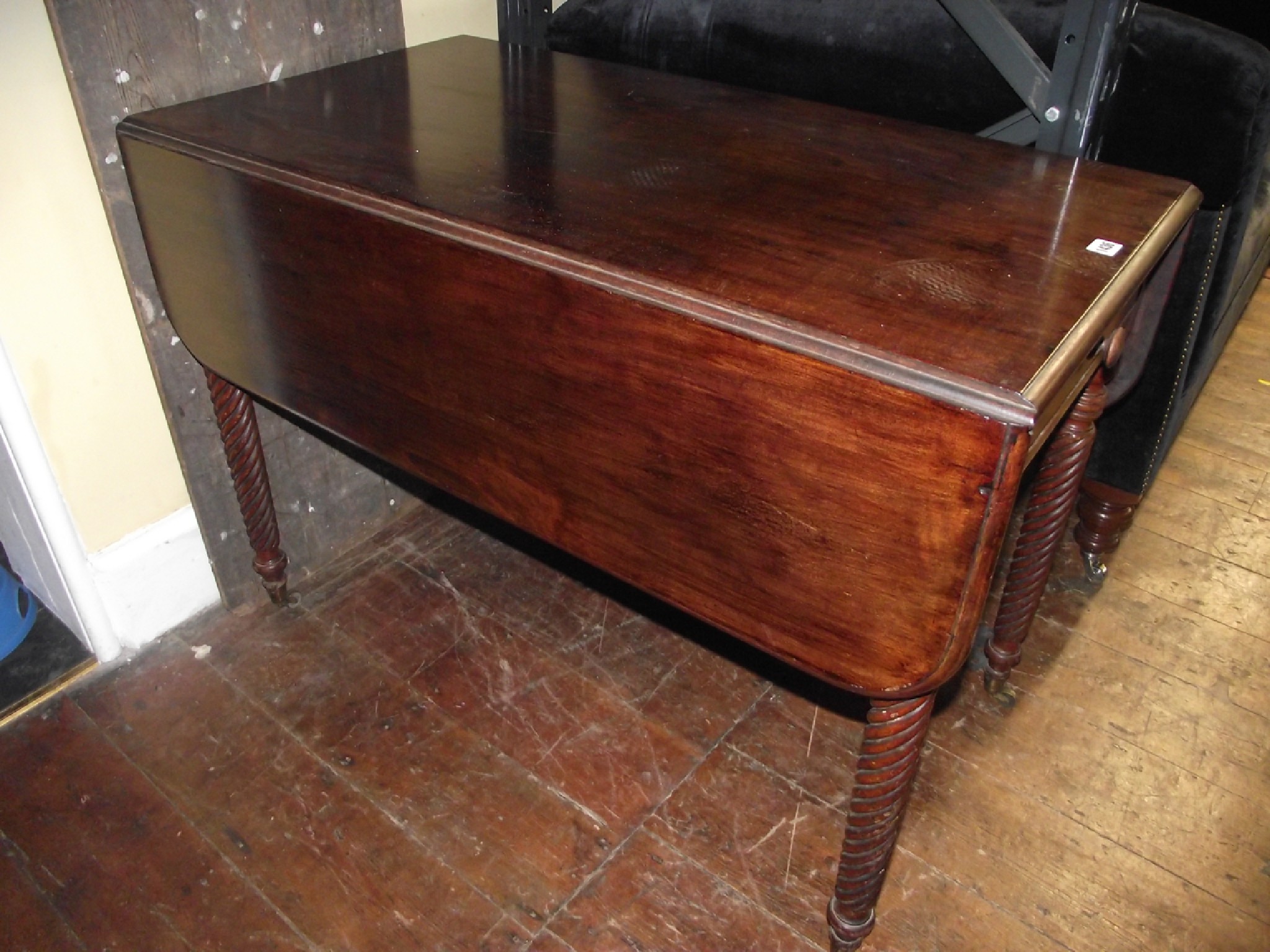 Appraisal: A Victorian mahogany Pembroke table with one real and one