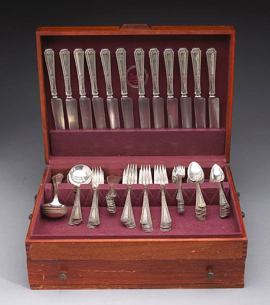 Appraisal: A sterling flatware set with matching pair casters with caseTowle