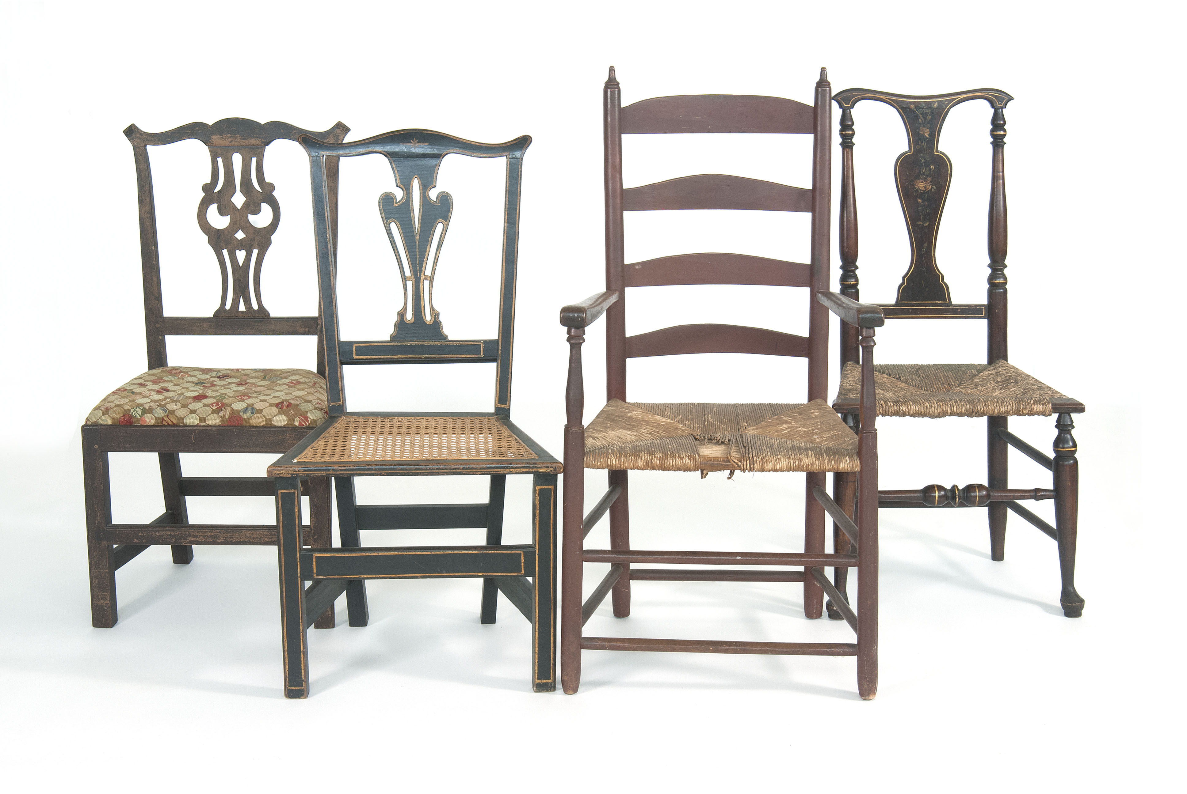 Appraisal: FOUR ANTIQUE CHAIRS a rush-seat ladderback armchair a Queen Anne