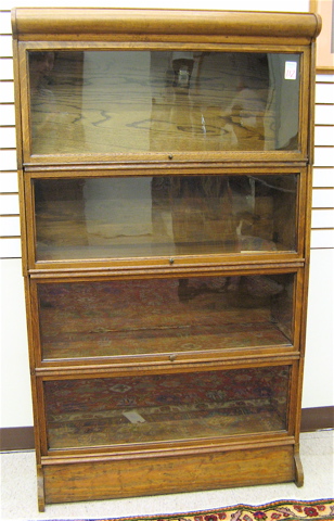 Appraisal: STACKING OAK BOOKCASE American c comprising four stacking horizontal bookcase