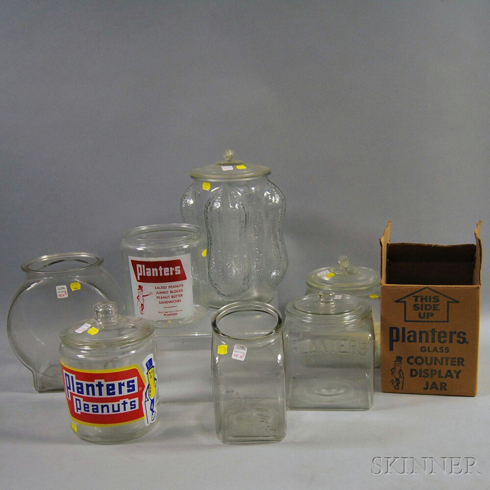 Appraisal: Seven Planters Peanuts Glass Countertop Jars one with four molded