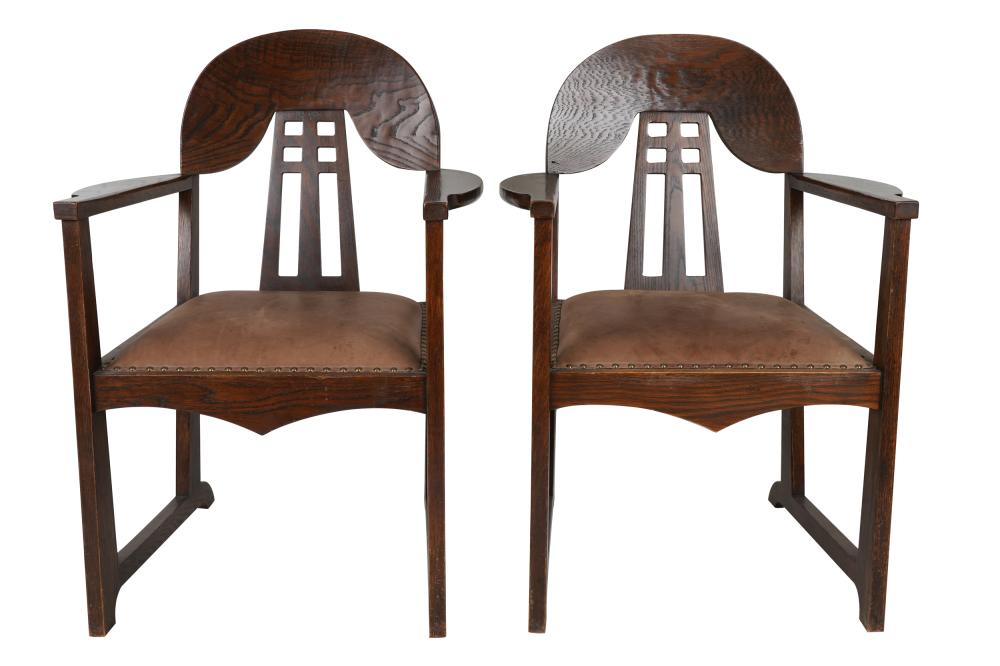 Appraisal: PAIR OF ARTS CRAFTS STYLE OAK OPEN ARMCHAIRSunsigned the seats