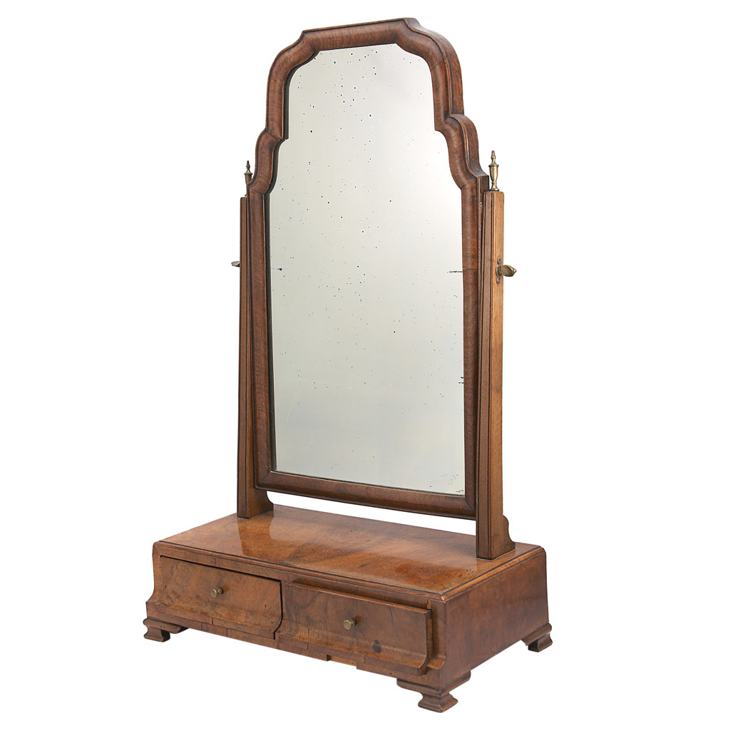 Appraisal: George II Walnut Shaving Mirror The arched rectangular mirror plate