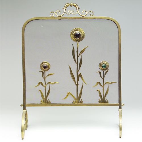 Appraisal: Aesthetic Movement brass fire screen decorated with three stylized flowers