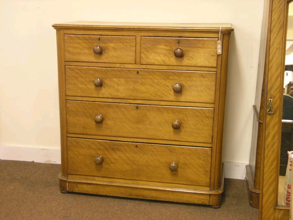 Appraisal: A Victorian satin-birch bedroom chest two short and three long