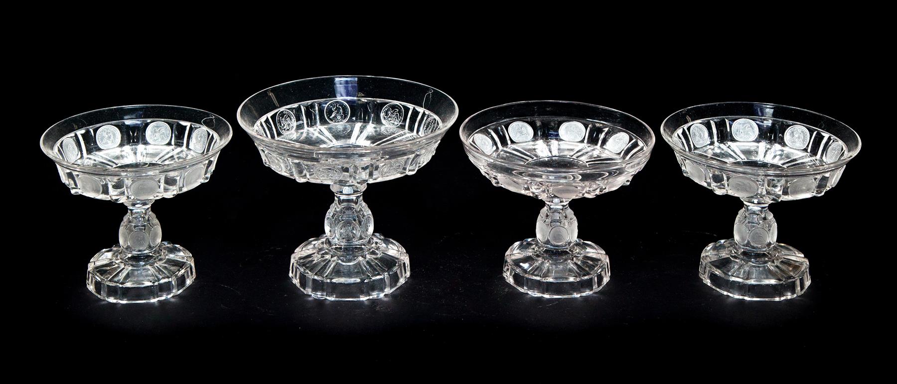 Appraisal: FOUR COIN GLASS OPEN COMPOTES WITH CANTED SIDES American late