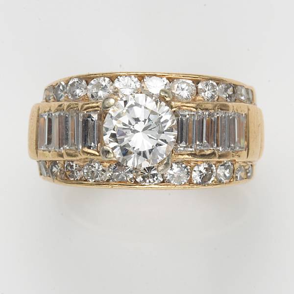 Appraisal: A diamond and fourteen karat gold ring centering a round