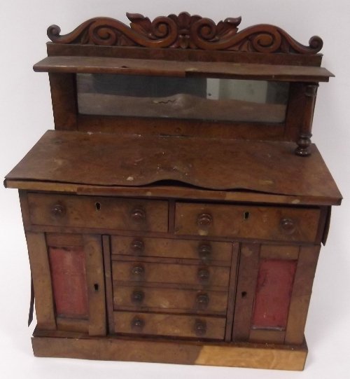 Appraisal: A Victorian miniature burr walnut chiffonier with mirror back superstructure