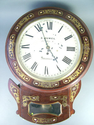 Appraisal: A regency mahogany cased trunk dial wall clock with brass