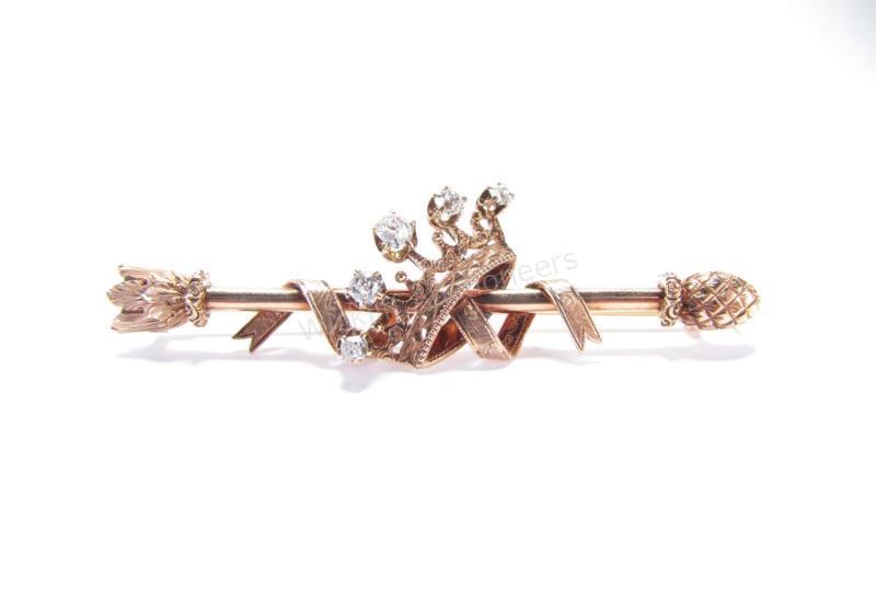 Appraisal: A K rose gold antique brooch with a five diamond