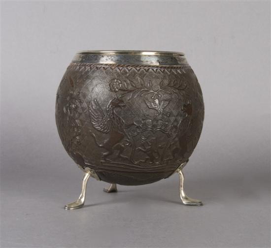 Appraisal: An English Carved and Silver Mounted Coconut Shell Height inches