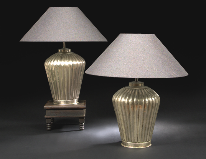 Appraisal: Pair of Silvered Metal Table Lamps each on a reeded