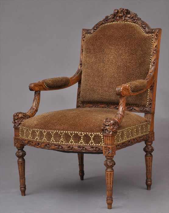 Appraisal: LOUIS XVI-STYLE CARVED WALNUT FAUTEUIL A LA REINE The padded