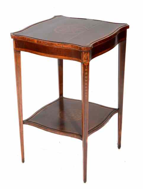 Appraisal: AN EDWARDIAN MAHOGANY TWO TIER LAMP TABLE with marquetry inlaid