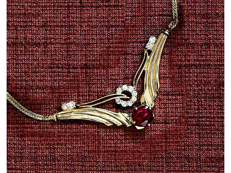 Appraisal: RUBY AND DIAMOND NECKLACE k yellow gold necklace set with