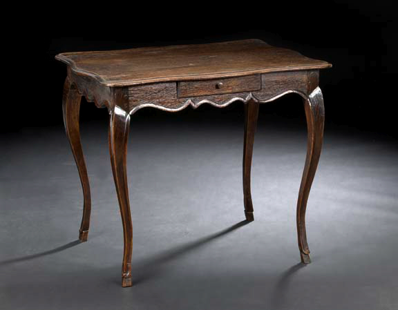 Appraisal: Louis XV-Style Provincial Oak Occasional Table late th century the