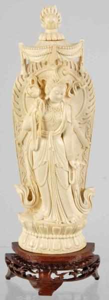 Appraisal: Ivory Goddess on Teak Wood Stand Carved ivory lady holding