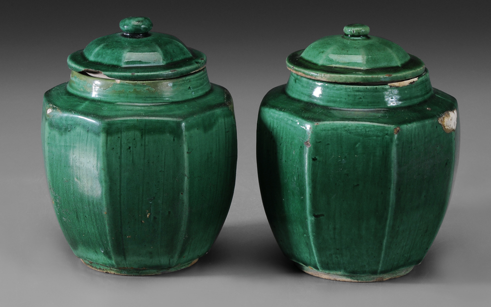 Appraisal: Two Ceramic Covered Jars Chinese tapered octagonal forms character marks