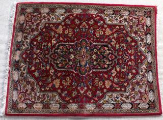 Appraisal: Kashan Prayer Rug Having a central medallion of dark blue